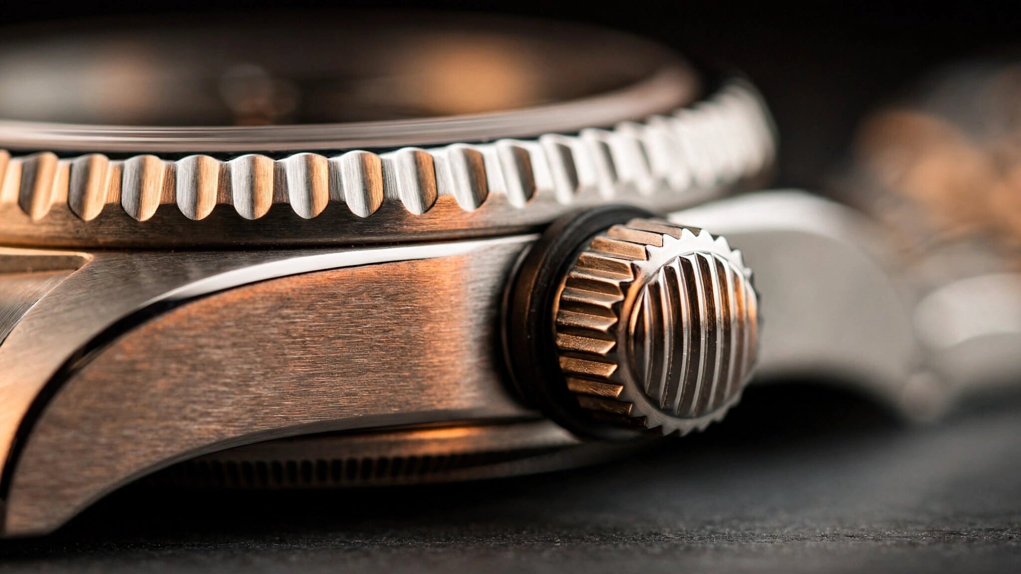Rolex Oyster case architecture detail showing the screw-down crown and middle case construction